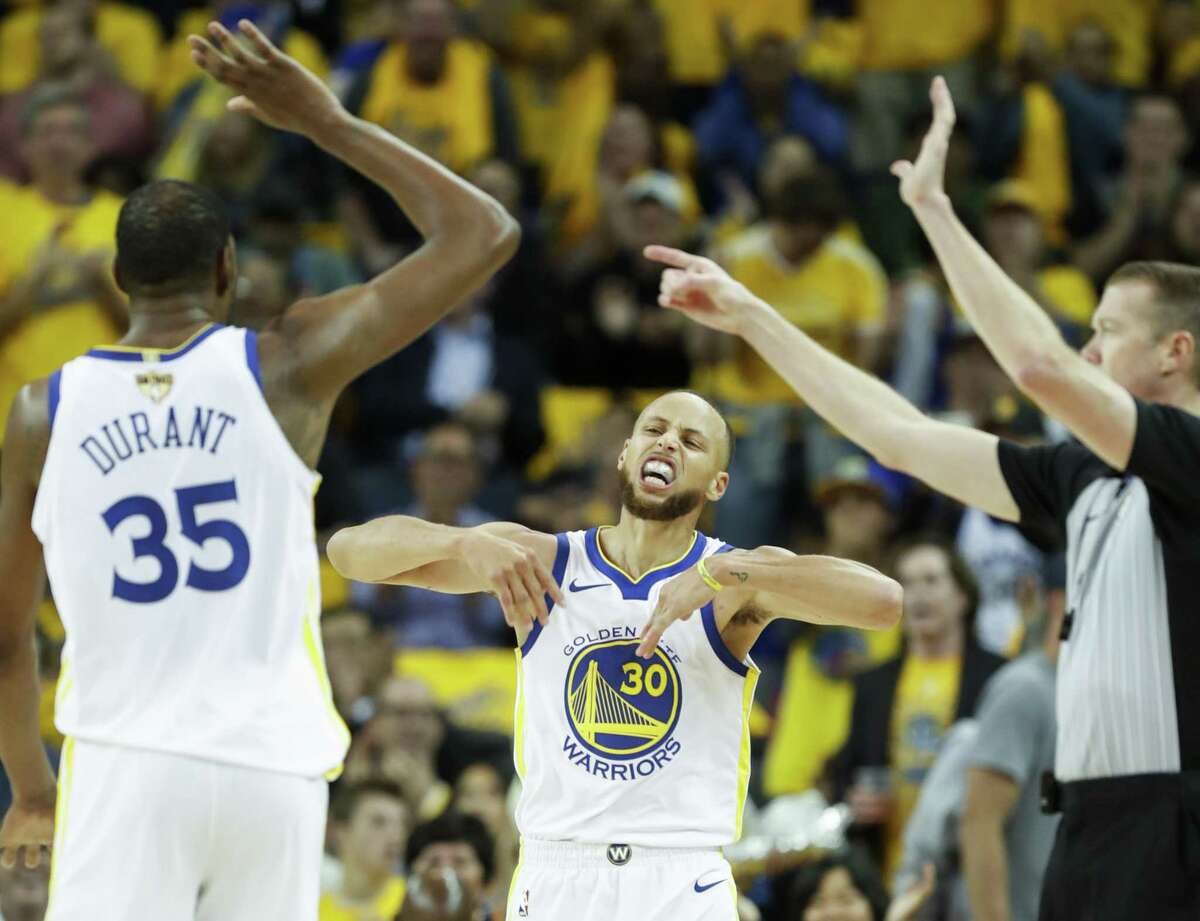 Golden State Warriors' Stephen Curry reacts in the third quarter during game 1 of The NBA Finals between the Golden State Warriors and the Cleveland Cavaliers at Oracle Arena on Thursday, May 31, 2018 in Oakland, Calif.