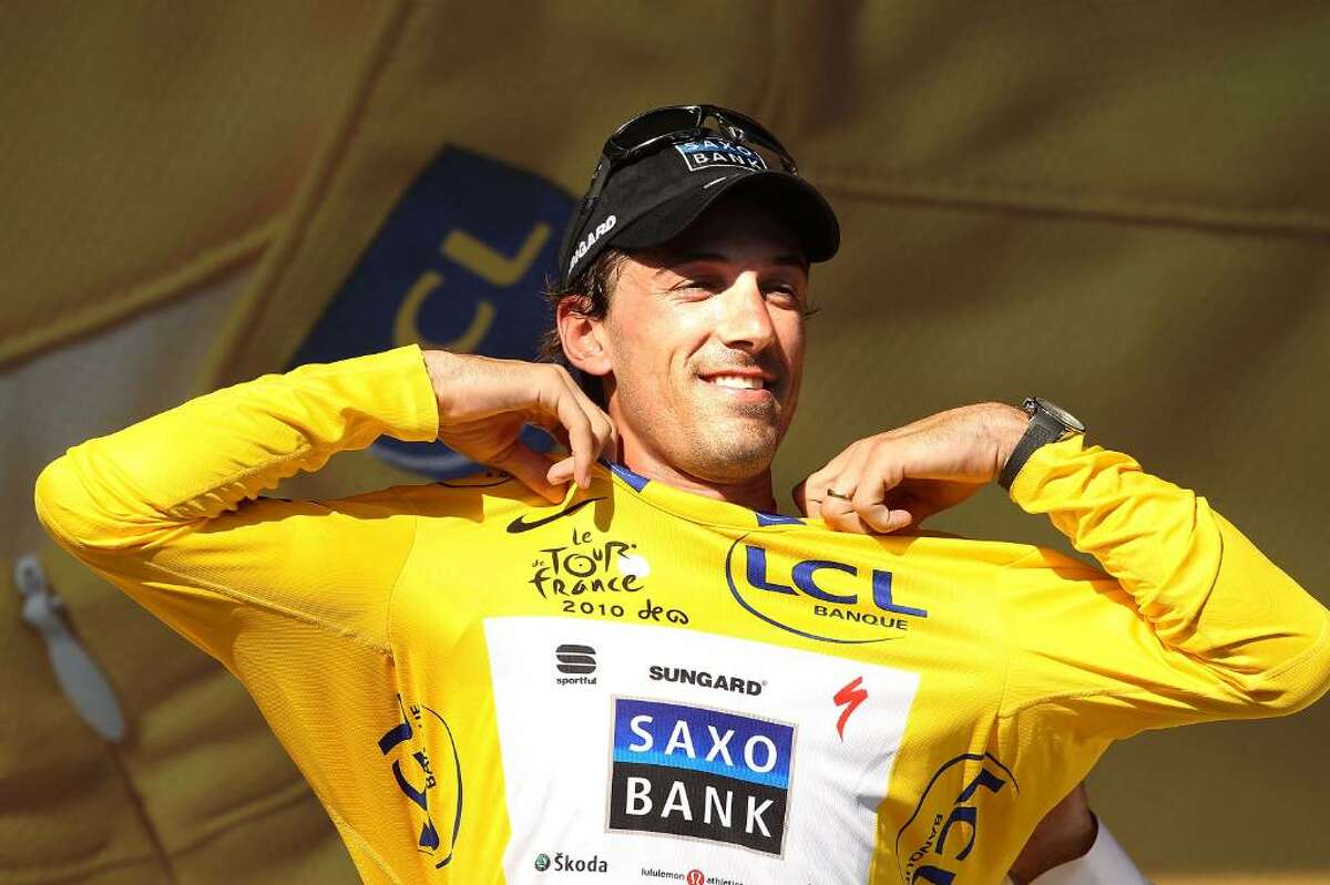 BRUSSELS, BELGIUM - JULY 04: Swiss rider Fabian Cancellara of team Saxo Bank retained the race leader's yellow jersey following stage one of the Tour de France July 4, 2010 in Brussels, Belgium. Alessandro Petacchi of Italy and team Lampre won the stage.The stage took the riders from Rotterdam to Brussels on a 223.5km course. Following the prologue yesterday, Swiss rider Fabian Cancellara of team Saxo Bank is wearing the race leaders yellow jersey. The iconic bicycle race will include a total of 20 stages and will cover 3,642km before concluding in Paris on July 25. (Photo by Spencer Platt/Getty Images) *** Local Caption *** Fabian Cancellara