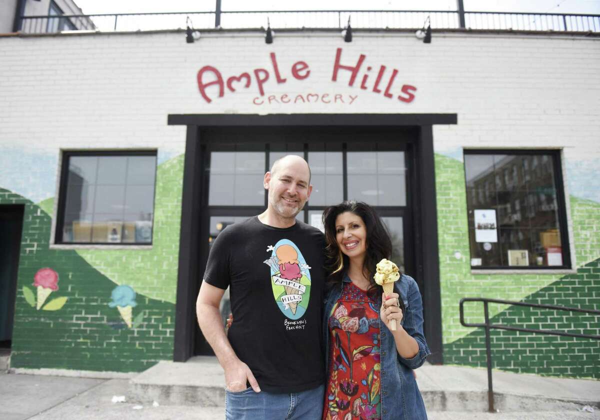 Ample Hills husband-and-wife co-owners Brian Smith, CEO, and Jackie Cuscuna, Chief Culture Officer, pose at Ample Hills Creamery in the Gowanus neighborhood of Brooklyn, N.Y. Thursday, April 12, 2018. Smith and Cuscuna's story of their shop becoming so immediately successful that they ran out of ice cream will appear on the new Rally podcast, hosted by Hearst Connecticut Media business reporter Macaela Bennett.