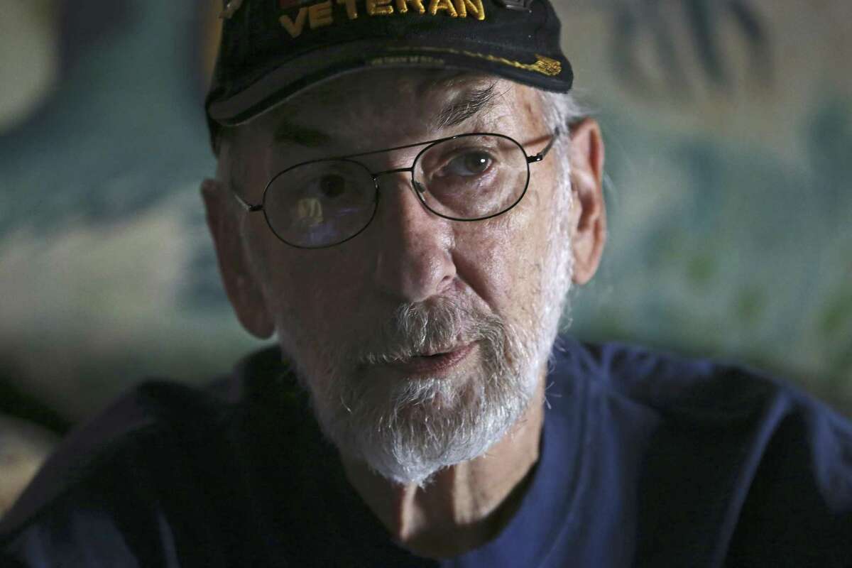 Vietnam veteran Michael Thompson, 67, talks about his Navy experience during an interview at his home near Medina Lake, Thursday, May 31, 2018. Thompson was exposed to Agent Orange while servicing planes on a carrier off the coast of Vietnam. He is fighting the Veterans Administration to recognize Blue Water Navy veterans as victims of Agent Orange exposure. Thompson suffers from several ailments his ascribes to Agent Orange.