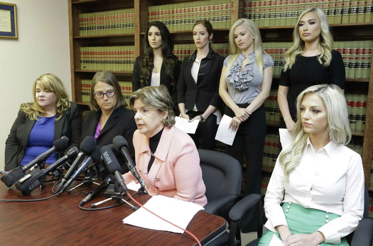 Attorney Gloria Allred speaks during a press conference announcing a lawsuit on behalf of five former Houston Texan NFL cheerleaders shown at the law offices of Kimberley Spurlock in Humble on Friday, June 1, 2018. Shown sitting left are attorneys Misty Cone and Kimberley Spurlock, Gloria Allred with former Houston Texans cheerleaders Kelly Nuner, sitting right, Ashley Rodriguez, standing left, Ainsley Parish, Morgan Wiederhold, and Hannah Turnbow, standing right. ( Melissa Phillip / Houston Chronicle )
