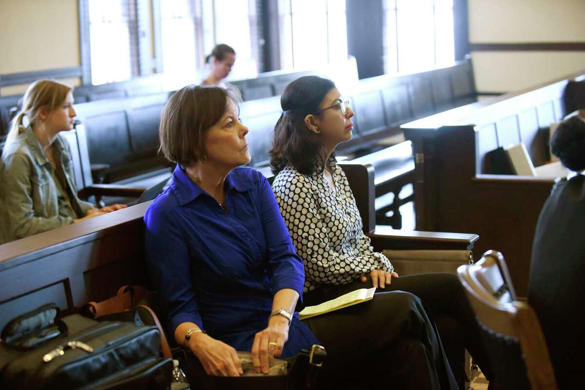 Shelley Potter, left, president of the SAISD teachers union, sits with Alejandra Lopez, second-grade teacher at Stewart Elementary School, during a hearing at the Bexar County Courthouse in 2018, in the union’s unsuccessful attempt to get a court order to block Democracy Prep Public Schools from taking over Stewart.
