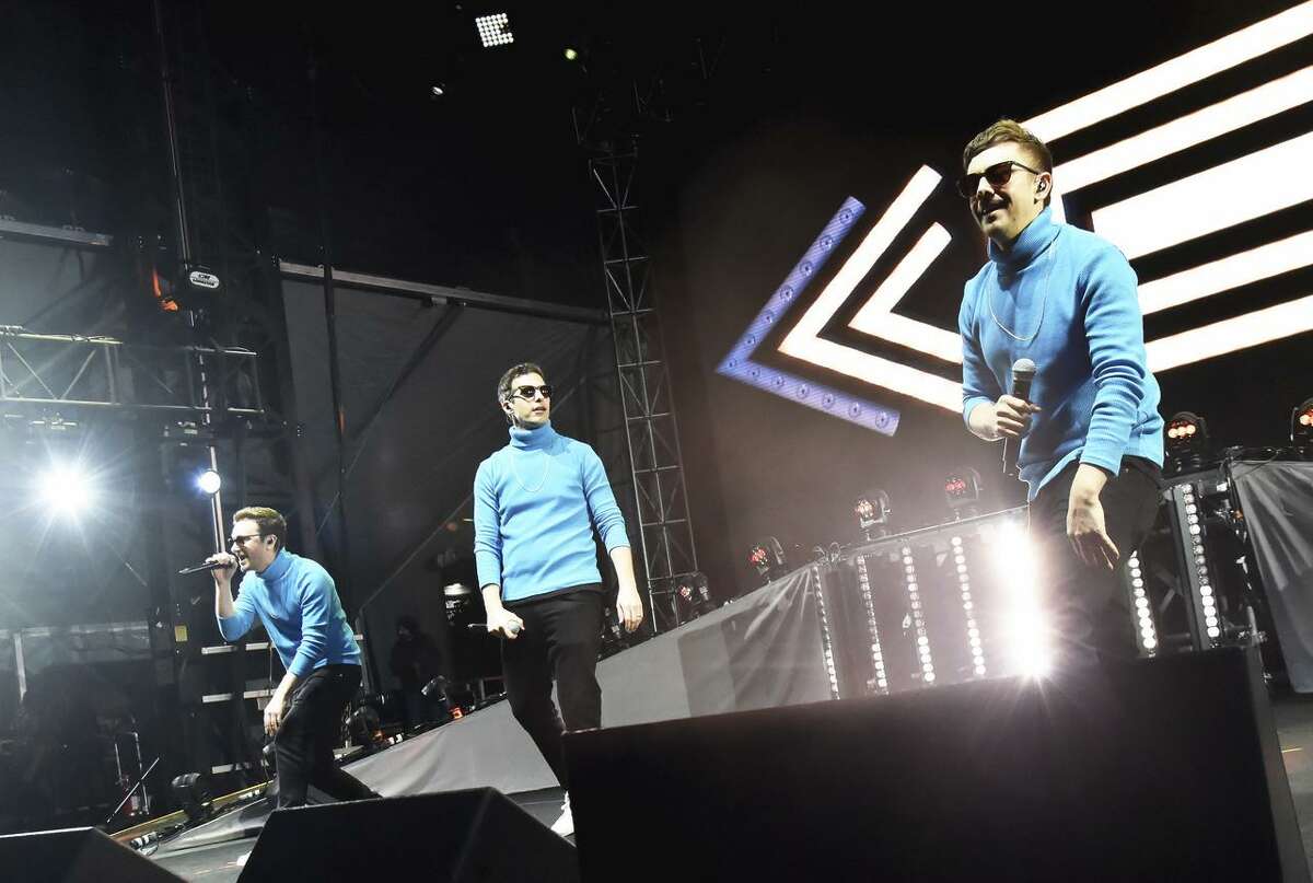 Akiva Schaffer (left), Andy Samberg and Jorma Taccone of the Lonely Island perform on the Colossal Stage during Clusterfest.