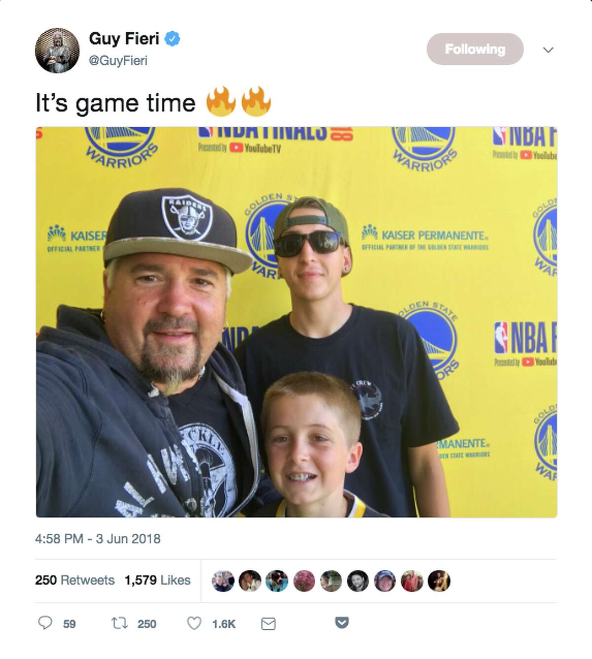 Celebrity chef and "Diners, Drive-Ins and Dives" host Guy Fieri with family at Oracle Arena for Game 2.