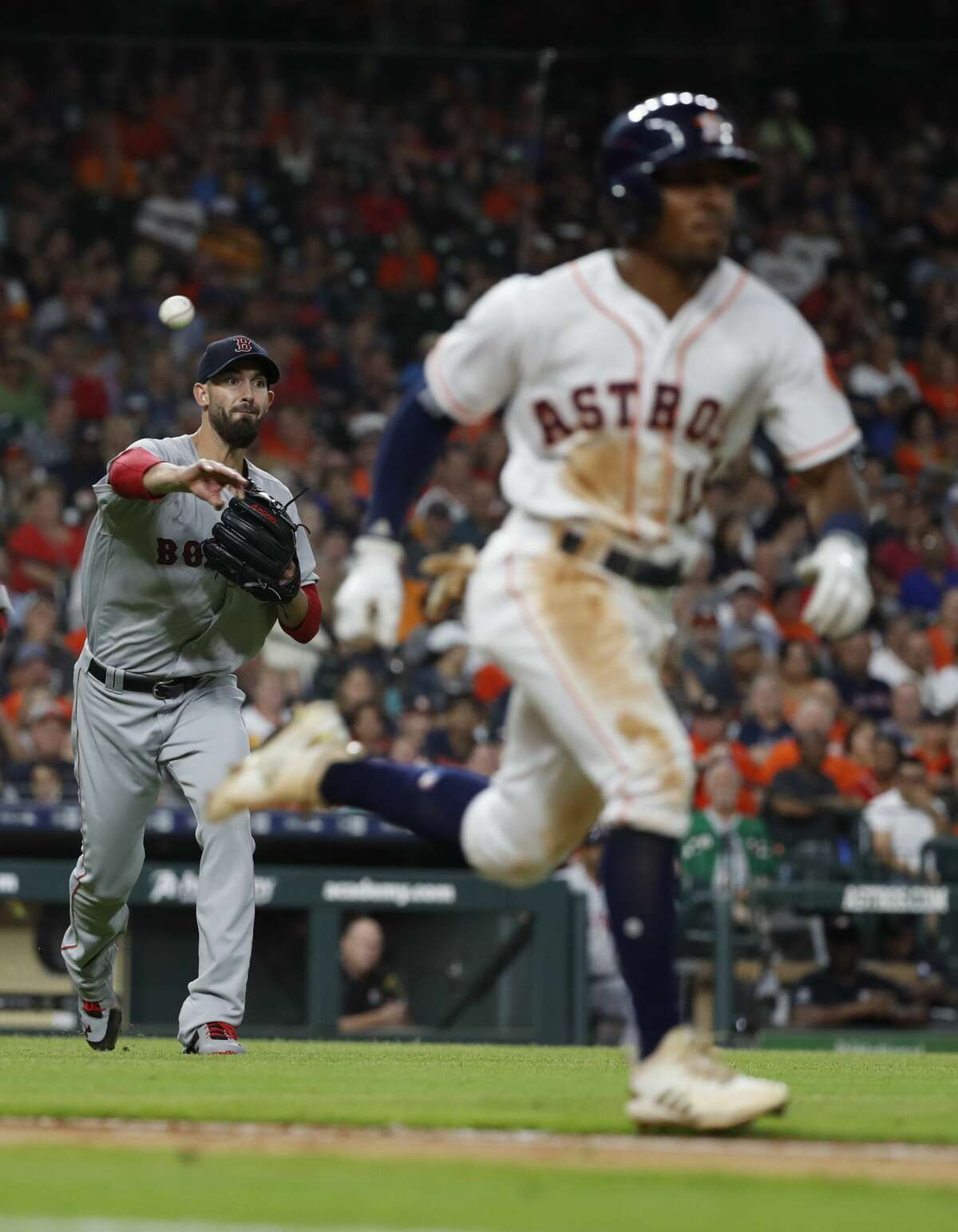 Boston Red Sox starting pitcher Rick Porcello (22) makes the throw to first base as Houston Astros Tony Kemp (18) hit into a sac bunt during the fifth inning of an MLB baseball game at Minute Maid Park, Sunday June 3, 2018, in Houston. ( Karen Warren / Houston Chronicle )
