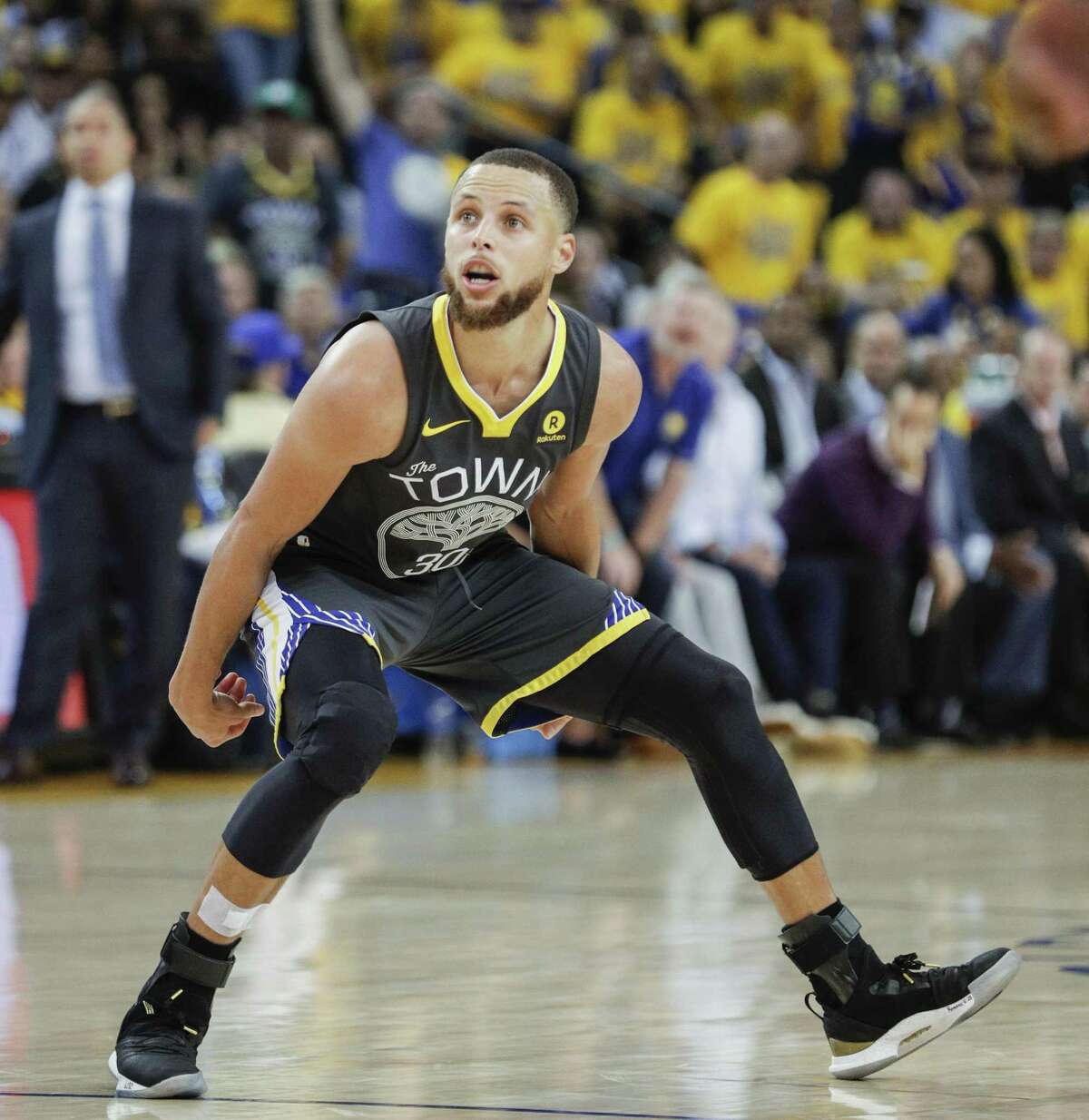 Golden State Warriors' Stephen Curry watches his second quarter three-pointer go in during game 2 of The NBA Finals between the Golden State Warriors and the Cleveland Cavaliers at Oracle Arena on Sunday, June 3, 2018 in Oakland, Calif.