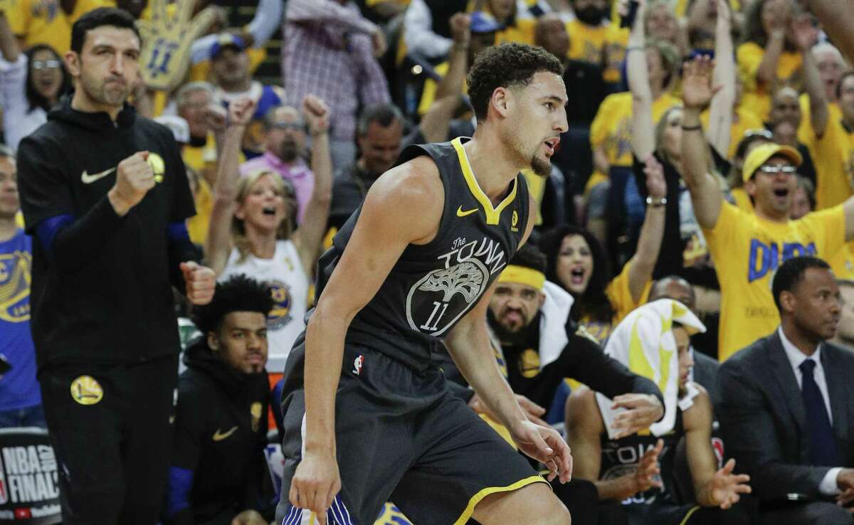 Golden State Warriors' Klay Thompson turns in transition after scoring in the second quarter during game 2 of The NBA Finals between the Golden State Warriors and the Cleveland Cavaliers at Oracle Arena on Sunday, June 3, 2018 in Oakland, Calif.