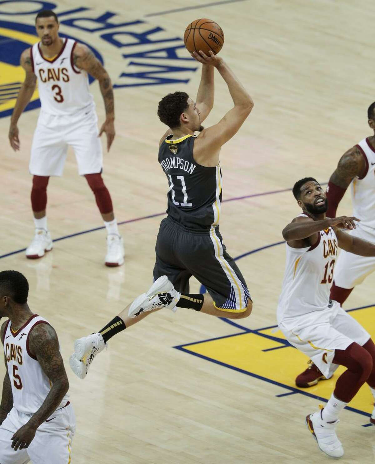 Warriors guard Klay Thompson does not look like a man with a high ankle sprain as he goes up for a shot over Cleveland Cavaliers center Tristan Thompson in the first quarter of Game 2 of the NBA Finals at Oracle Arena.