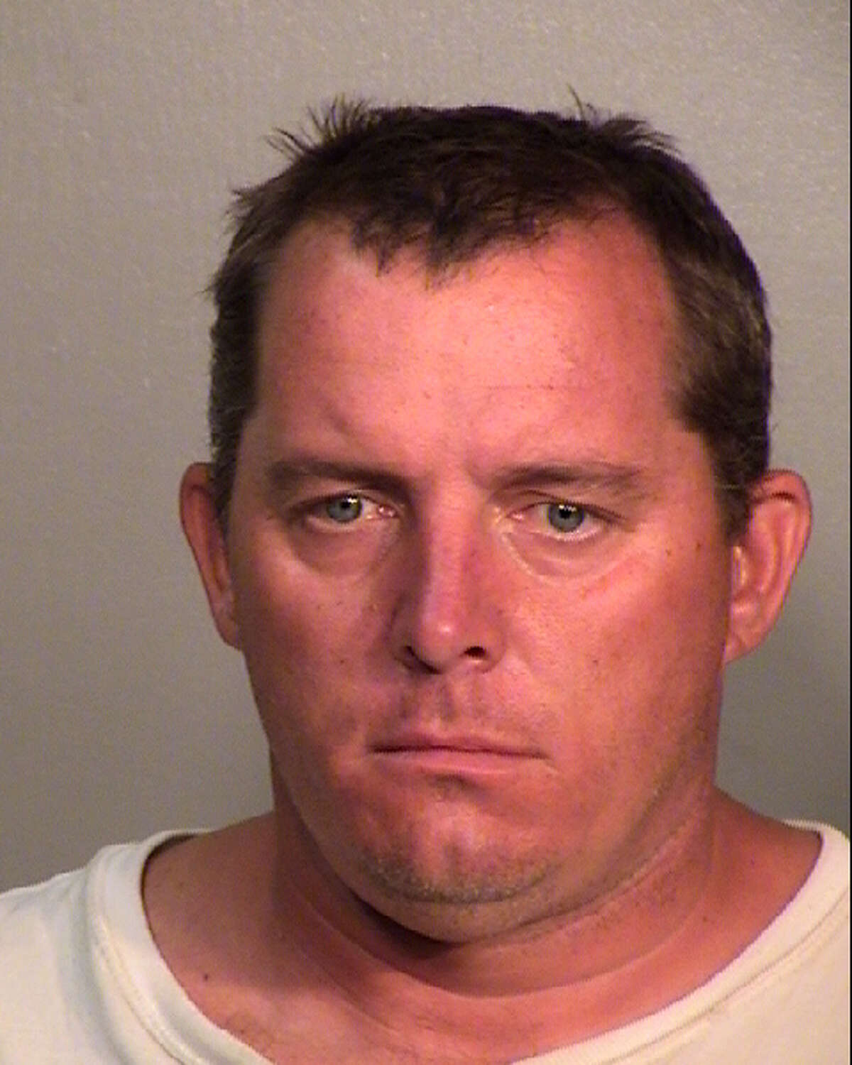Barry Uhr, a paramedic with the San Antonio Fire Department, was arrested Saturday on a charge of family violence.