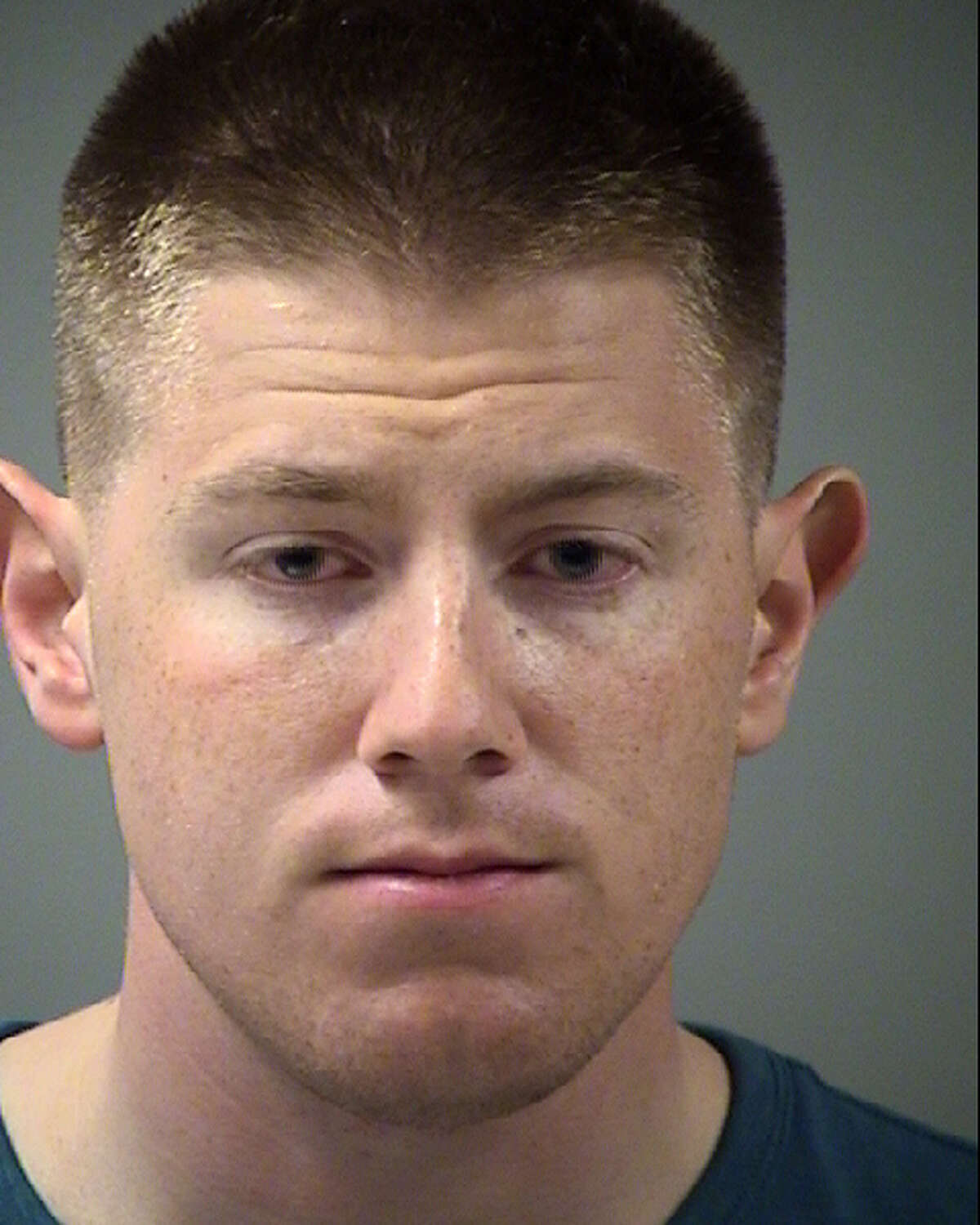 Officer Michael Sepanski, 25, is accused of using his forearm to block his wife's airway around midnight in the 2100 block of Atlas Bend and then fleeing the home.