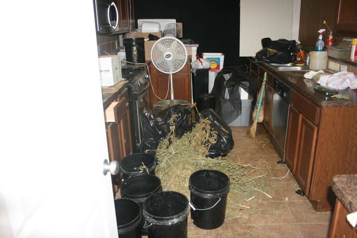 BEFORE PHOTOS: These photos were taken in October 2012 by the Houston Police Department after they investigated Andrew Nguyen for growing marijuana in his home on Willow Wind Lane.