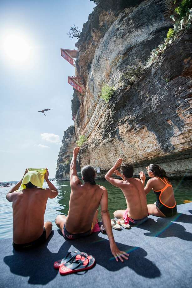 stunning photos show people cliff diving from texas hells gate