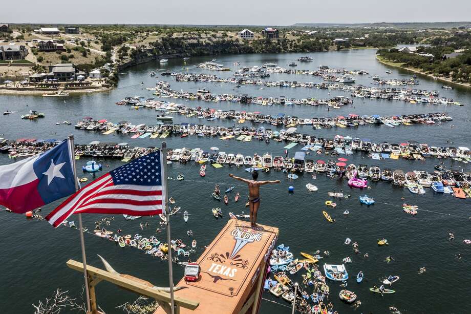 stunning photos show people cliff diving from texas hells gate
