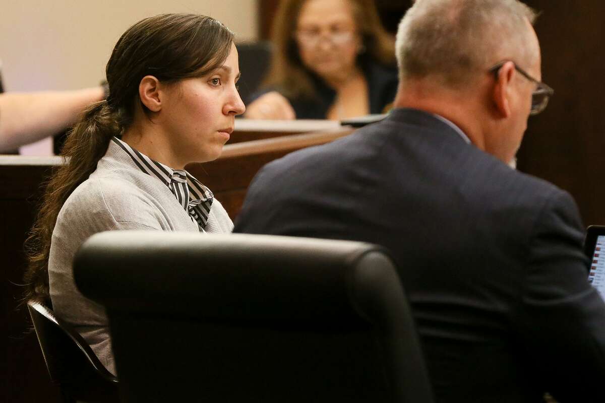 Andira Abdelaziz sits with defense attorney Mike McCrum as testimony continues in her murder trial in the 226th state District Court, presided by judge Sid Harle, in the Cadena-Reeves Justice Center on Monday, June 4, 2018. Abdelaziz is accused of killing her nephew by marriage, Mohammed Abdelaziz, who also was her lover.