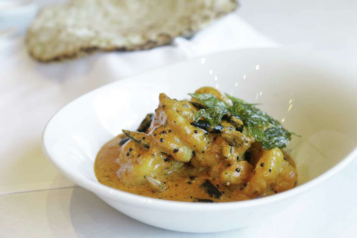 Surya India's Prawn Mangalorean has a coconut base and is finished with mustard, curry leaves and chillies.