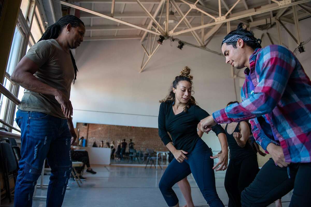 Artistic director Ramon Ramos Alayo (left) choreographs a rumba with dancers Jillian Miller (center), Adonis Martin Qui�ones (right) and other members of the Alayo Dance Company in preparation for the Cuba Caribe Festival, in San Francisco on Friday, June 1, 2018.