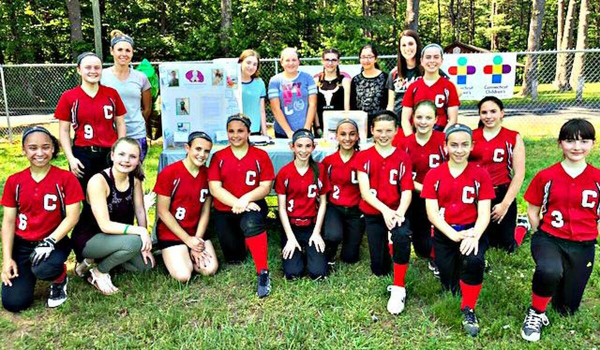 Cromwell Middle School softball players recently held a Strike out Cancer benefit during its game against Strong Middle School in Durham.