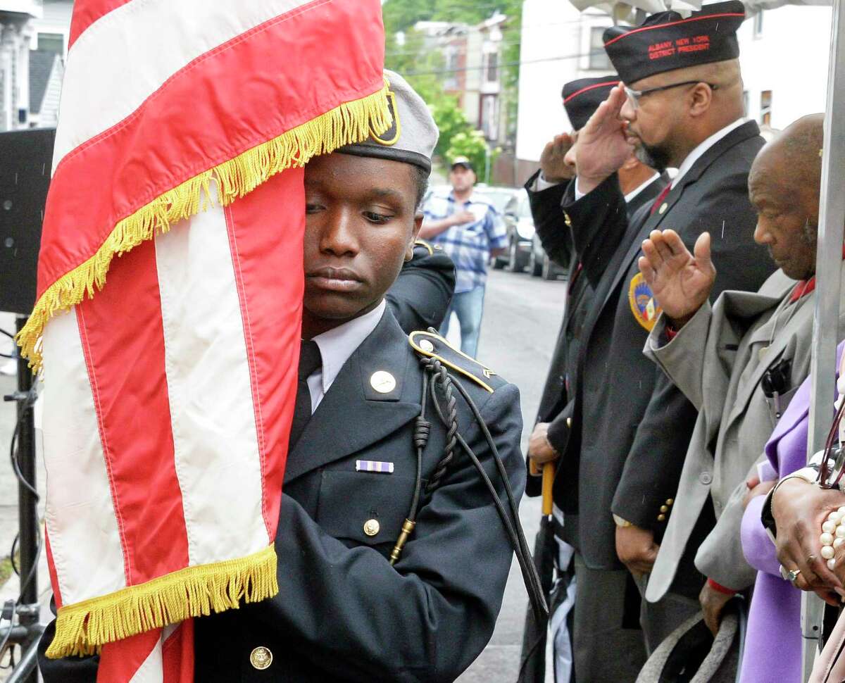 Kyle Pendergast of the Albany High SchoolJunior ROTC Sgt. Henry Johnson Battalion Color Guard carries the flag during the 2nd Annual Henry Johnson Day observance Tuesday June 5, 2018 in Albany, NY. (John Carl D'Annibale/Times Union)