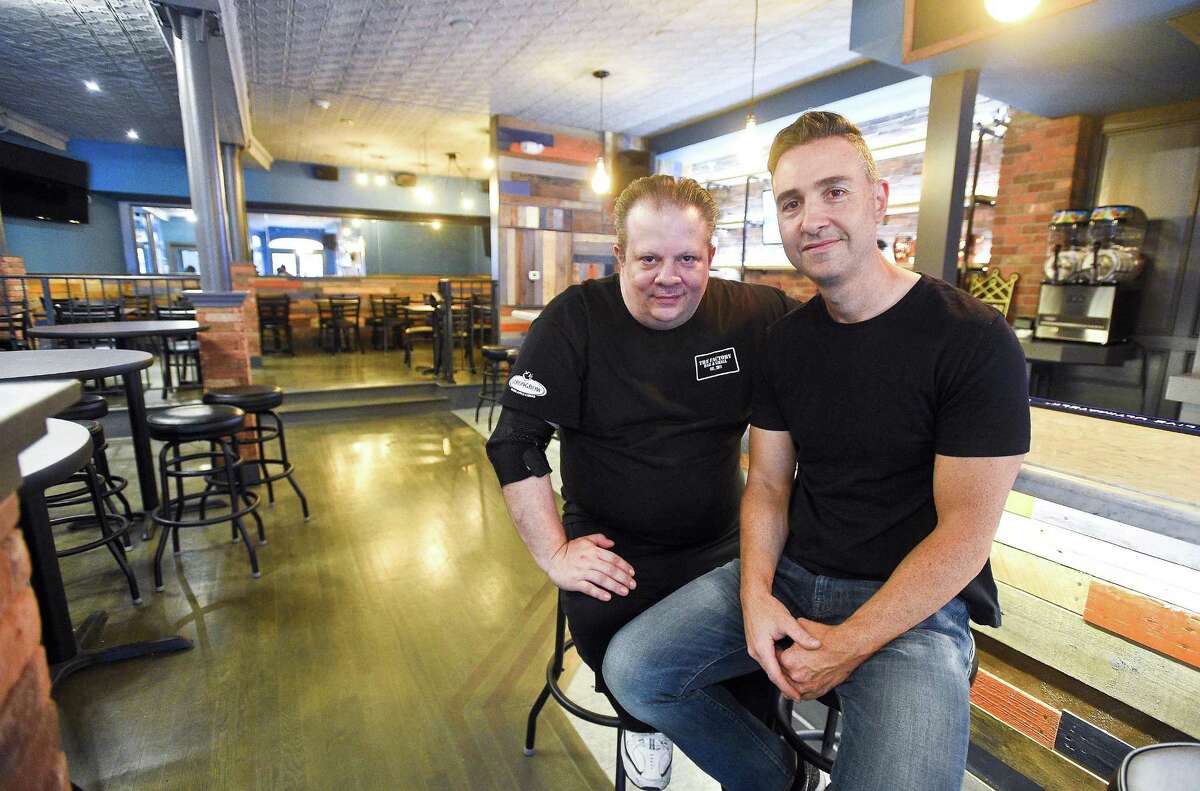 Louie Colantonio and Donny Guarino, two of The Factory Bar & Grill’s three managing partners, are photographed at the restaurant, at 261 Main St., in downtown Stamford, Conn., on May 22, 2018