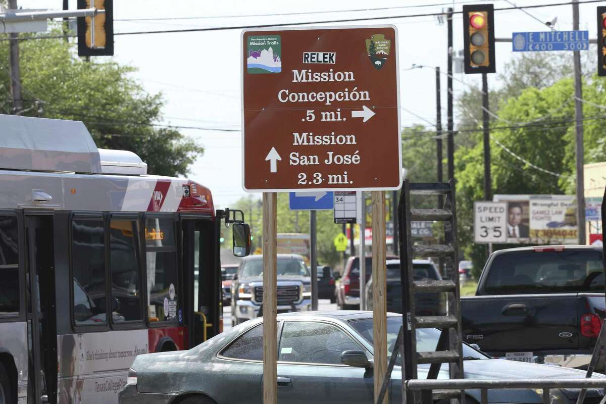 A guidepost leads visitors to the missions through Roosevelt Avenue. On Tuesday, the Zoning Commission voted 5-3 in favor of a city proposal to downzone businesses it believes are hampering economic development near the mission World Heritage sites. But a zoning change requires six votes to win approval, so the commission is technically making a recommendation of denial to City Council, which is set to consider the proposal it in August.