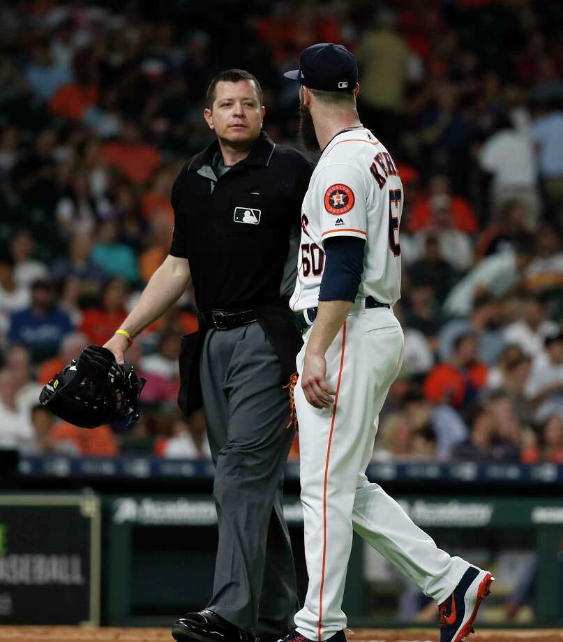 Houston Astros starting pitcher Dallas Keuchel (60) has words with home plate umpire Carlos Torres after getting pulled during the seventh inning of an MLB game at Minute Maid Park, Tuesday, June 5, 2018, in La Porte. Photo: Karen Warren, Houston Chronicle / © 2018 Houston Chronicle