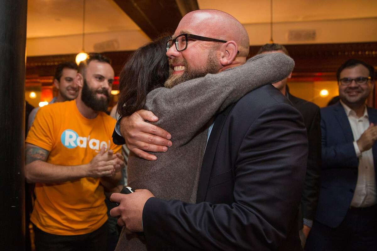 Hillary Ronen, San Francisco Supervisor for District Nine, hugs Rafael Mandelman as he arrives to Cafe du Nord on Tuesday night for Election night gathering. June 5, 2018 in San Francisco Calif. Rafael Mandelman is running to represent District 8 on the San Francisco Board of Supervisors.