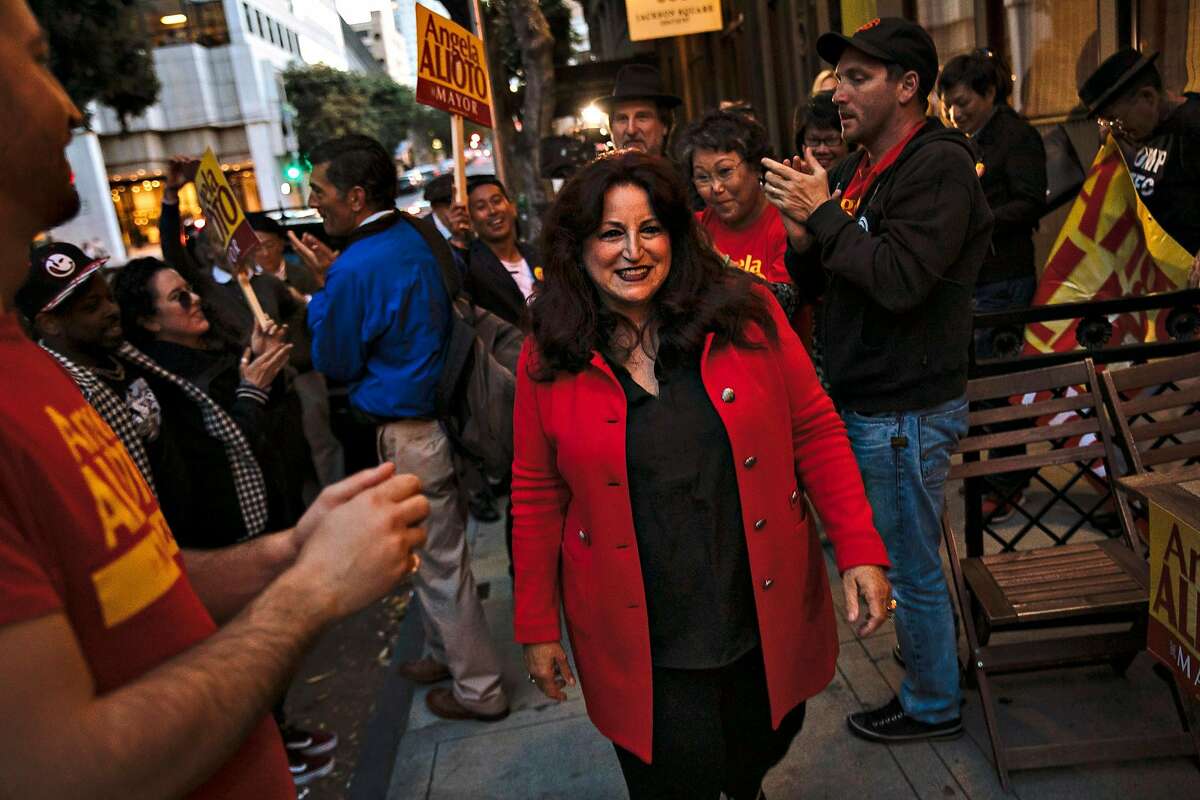 Supporters cheer San Francisco mayoral candidate Angela Alioto before entering the Taverna Aventine for her election party in San Francisco, Calif., Tuesday, June 5, 2018.