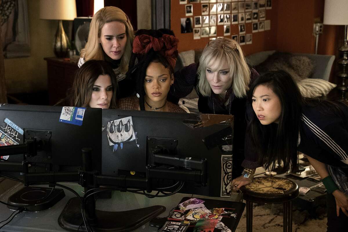 This image released by Warner Bros. shows, from foreground left, Sandra Bullock Sarah Paulson, Rihanna, Cate Blanchett and Awkwafina in a scene from "Ocean's 8." (Barry Wetcher/Warner Bros. via AP)