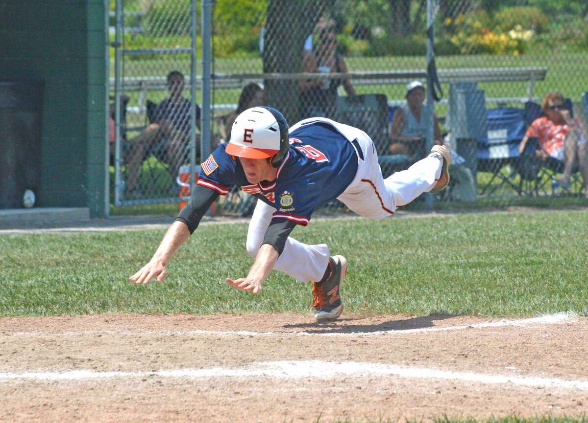 Will Messer of the Edwardsville Post 199 Bears slides for the plate to score a run during the 2017 season. Messer will play for the Bears again this season.