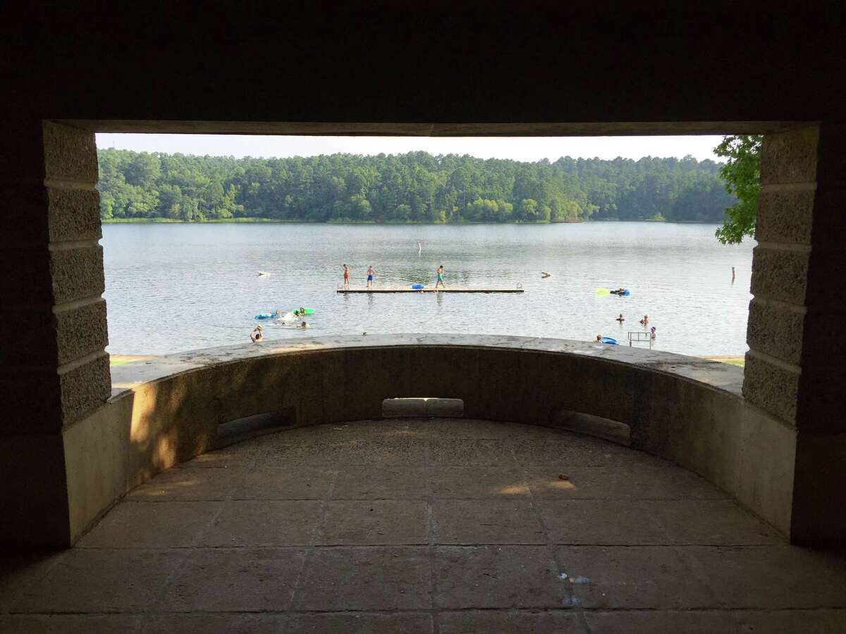 A view of the swimming beach through one of the picnic pavilions at Tyler State Park.