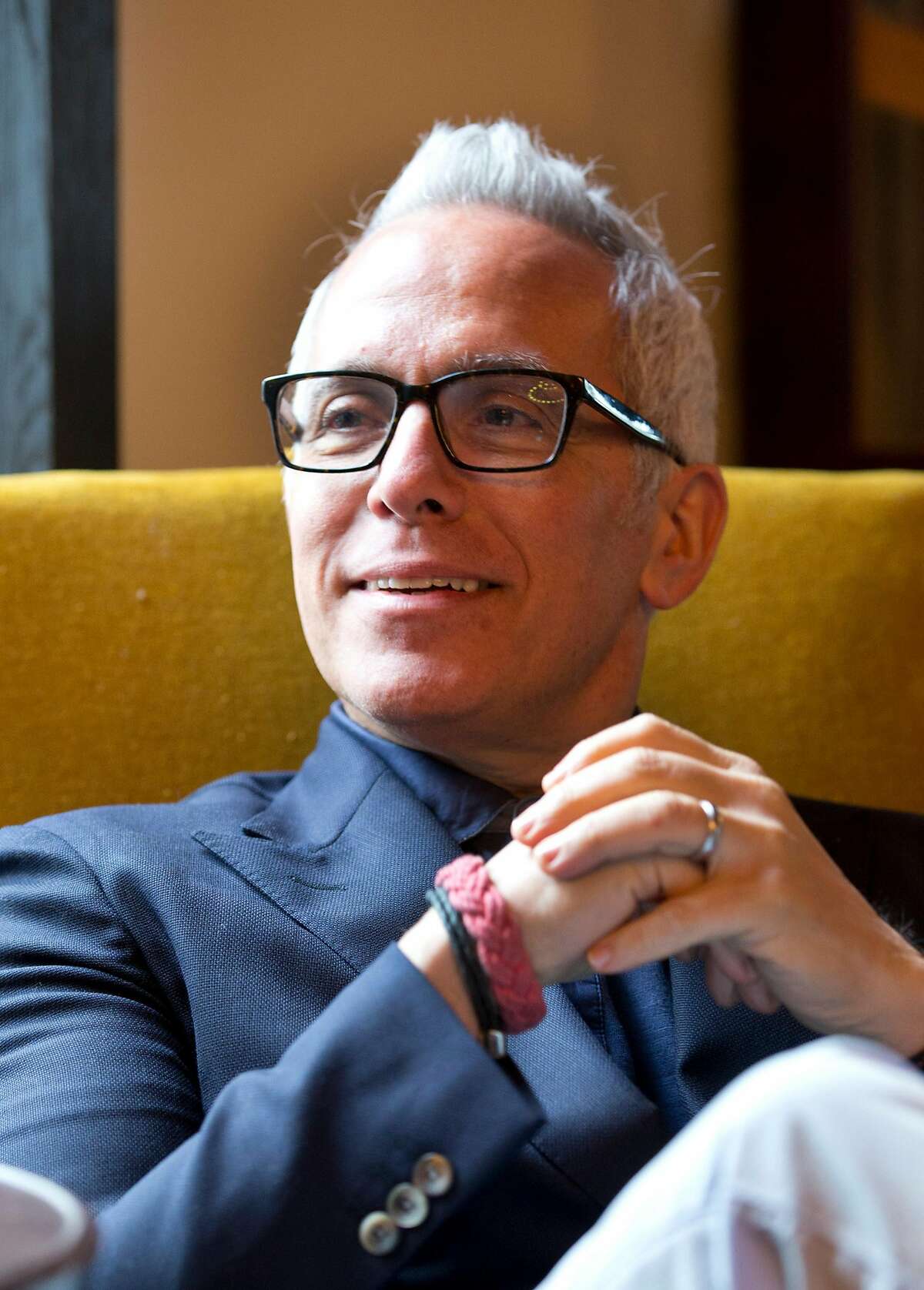 Chef Geoffrey Zakarian listens to a question during an interview with The Associated Press, Friday, Feb. 20, 2015, in Miami Beach, Fla. Now honored with an Iron Chef title, a judging seat on "Chopped" and a best-selling cookbook, Zakarian says opening a restaurant is a lot like playing poker. "It's a crap shoot. We gamble when we open a restaurant," said Zakarian, whose restaurants include The Lambs Club and The National. (AP Photo/Wilfredo Lee)