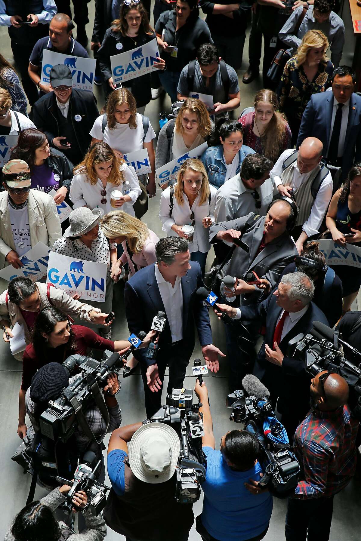 Gavin Newsom greets supporters and talks to members of the news media inside the Ferry Building, Wednesday, June 6, 2018, in San Francisco, Calif. Lt. Gov. Newsom (D) will face Republican businessman John Cox in the race to be the next Governor of California.