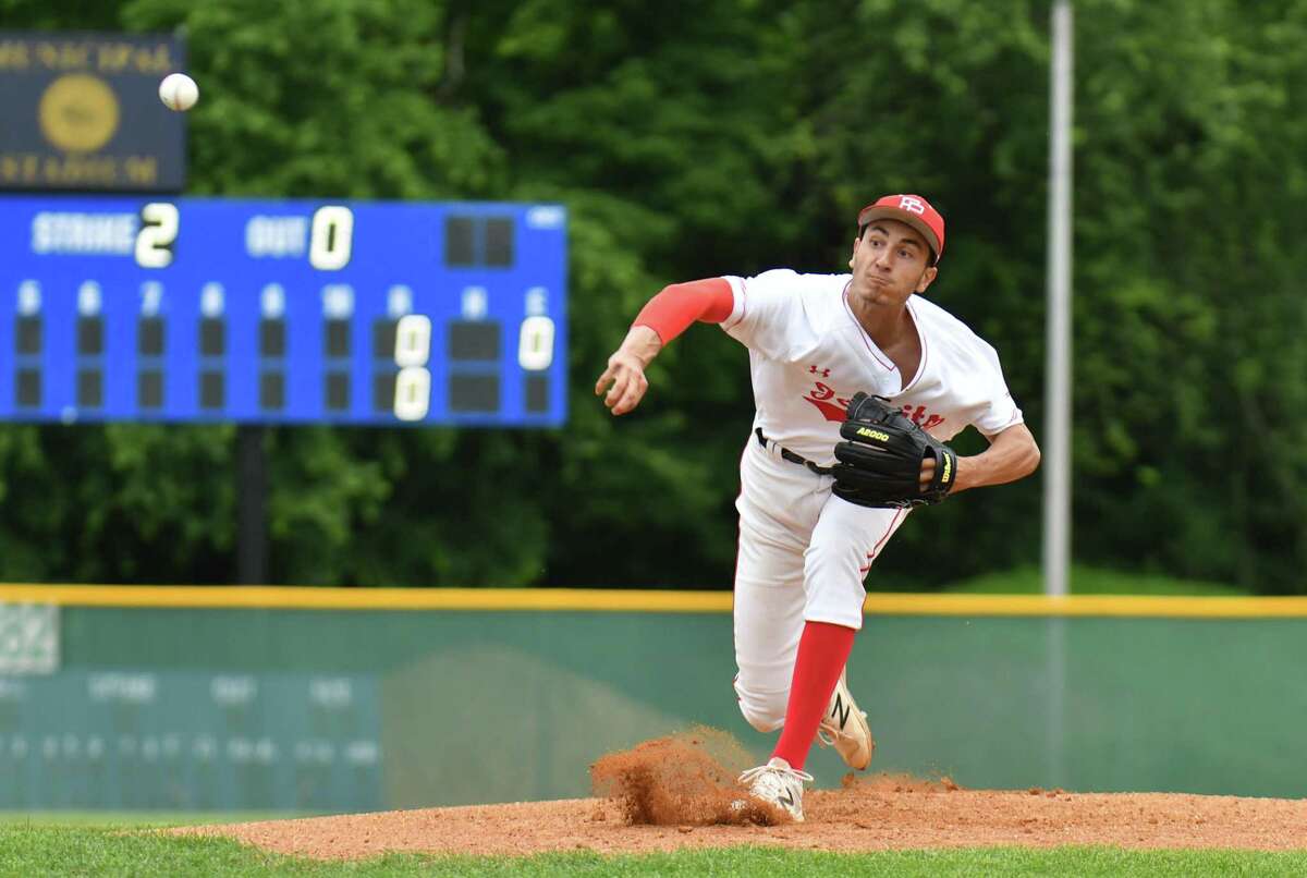 Starting pitcher Adam Stone (25) of the Fairfield Prep Jesuits delivers a pitch during the Class LL baseball semifinal round against the Cheshire Rams on Wednesday June 6, 2018, at Municipal Stadium in Waterbury, Connecticut.