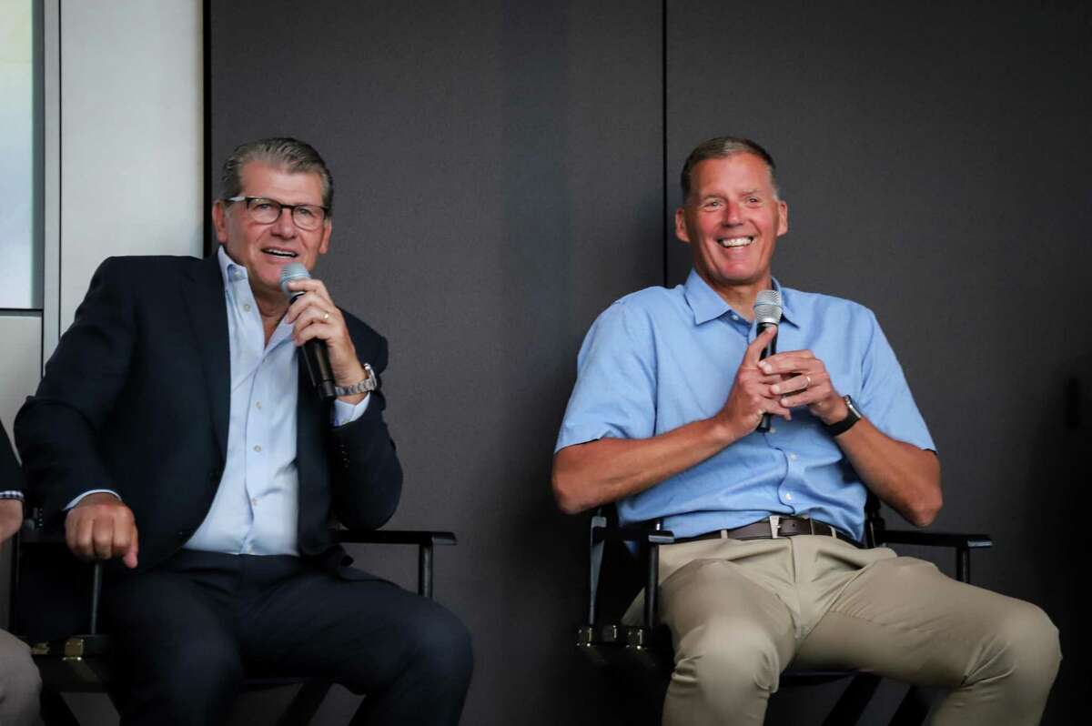 Geno Auriemma, left, and Randy Edsall participate in the UConn Coaches Road Show on Wednesday at Hearst Tower in New York City.