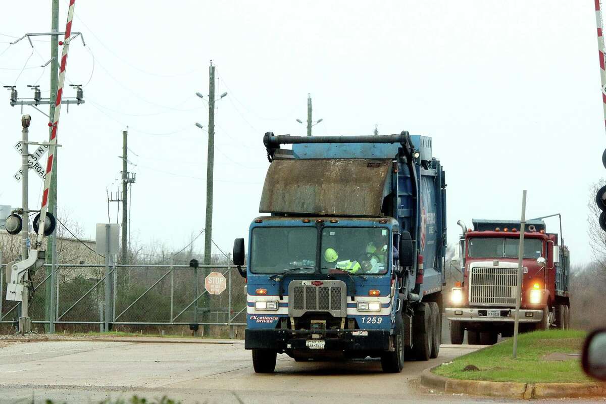 Trucks exit the Blue Ridge Landfill in Fresno.