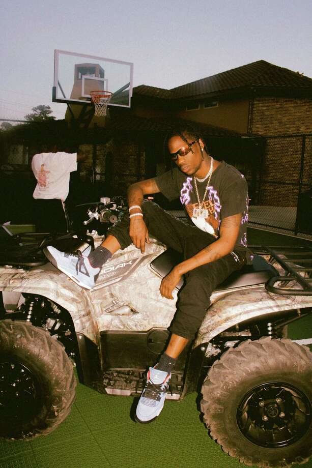 travis scott wearing jordan 4