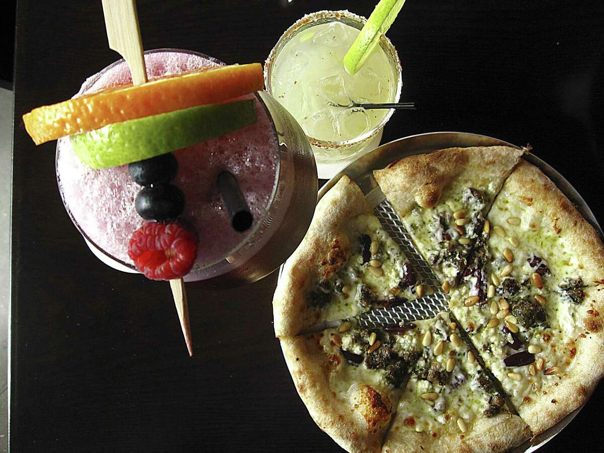Red sangria, a cucumber margarita and a pizza with lamb, feta, olives and pine nuts from Acú Bistro Bar.