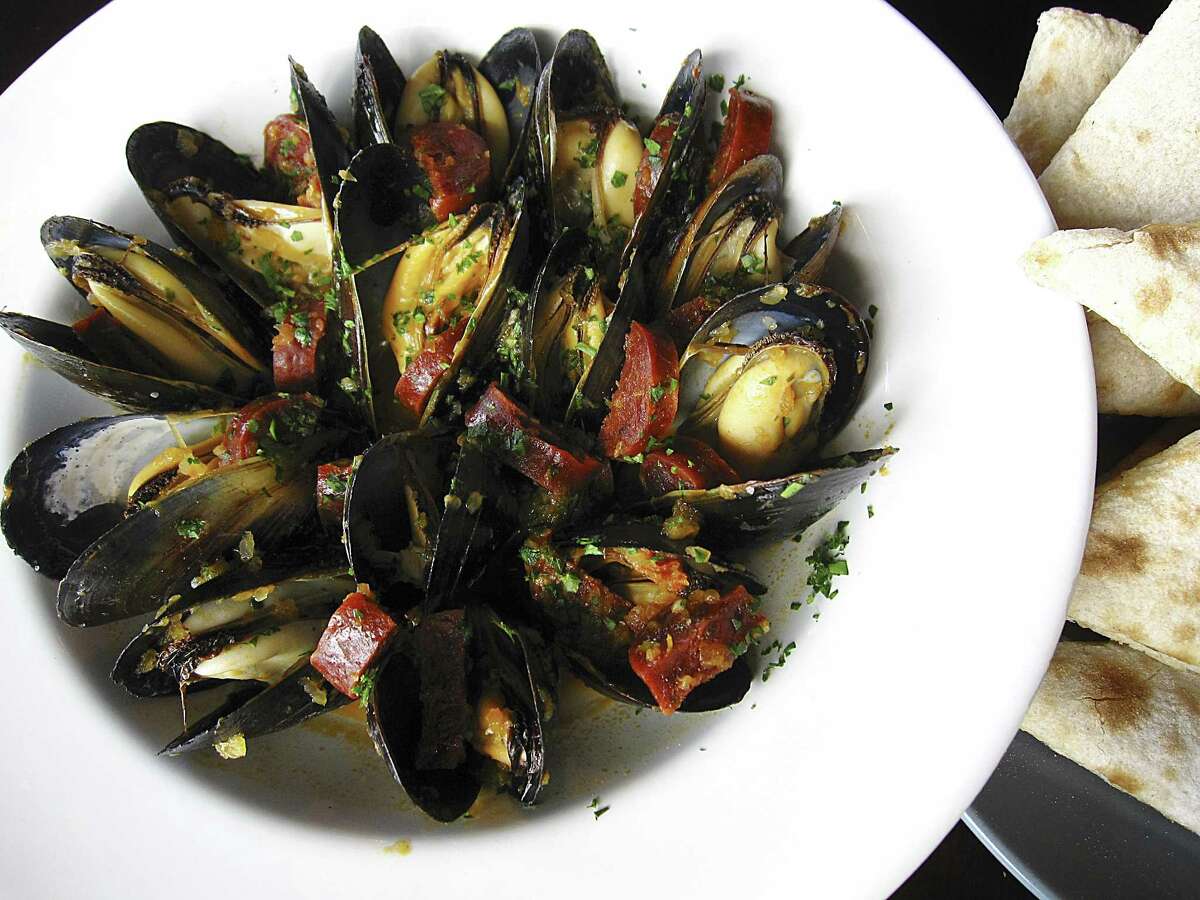 Mussels with Spanish chorizo in white wine sauce from Acú Bistro Bar.