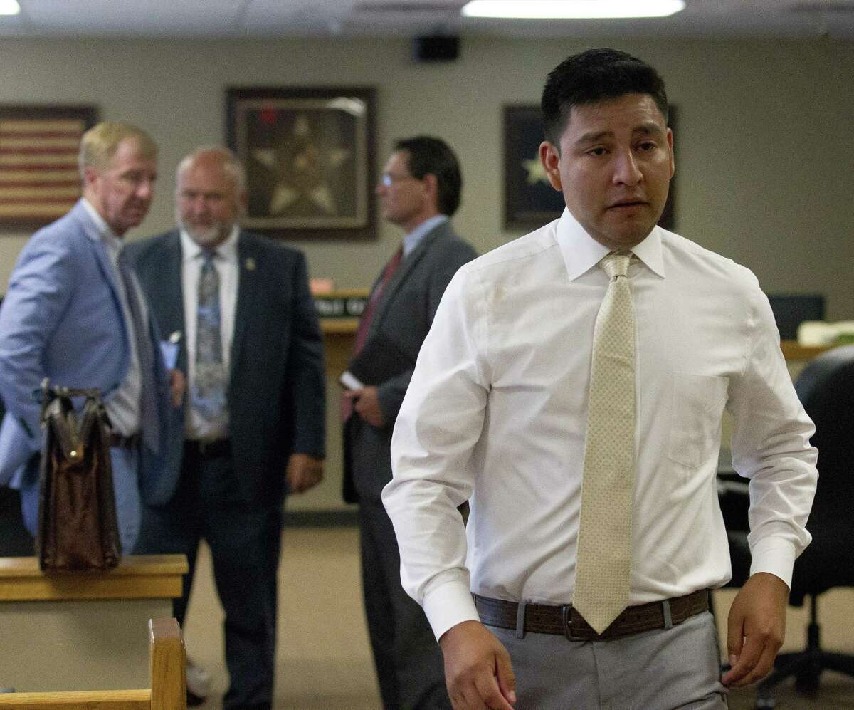 Christopher Delacruz of Magnolia leaves the courtroom after he was found not guilty of murder during a trial in Judge Phil Grants 9th state District court at the Lee G. Alworth Building on Thursday, June 7, 2018, in Conroe. The trail stemmed from the May 2017 shooting of 56-year-old Jose Augusto Lozada outside of his residence in Magnolia.