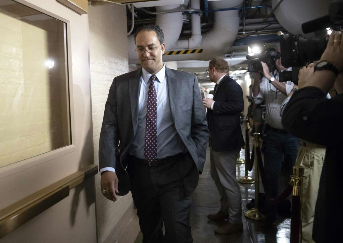 Rep. Will Hurd, R-Texas, whose congressional district runs along the majority of Texas's border with Mexico, arrives for a closed-door GOP meeting in the basement of the Capitol as the Republican leadership tries to reach a policy agreement between conservatives and moderates on immigration, in Washington, Thursday, June 7, 2018. (AP Photo/J. Scott Applewhite)