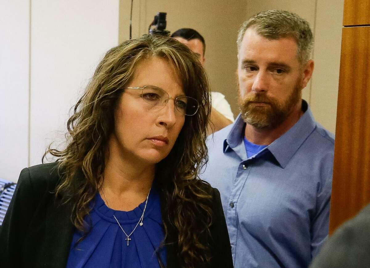 Harris County Sheriff's deputy Chauna Thompson and her husband, Terry Thompson, arrive to court, Tuesday, June 13, 2017. A jury agreed on a 25-year prison sentence for Terry Thompson in the choking death of John Hernandez during a sentencing hearing in 2018.