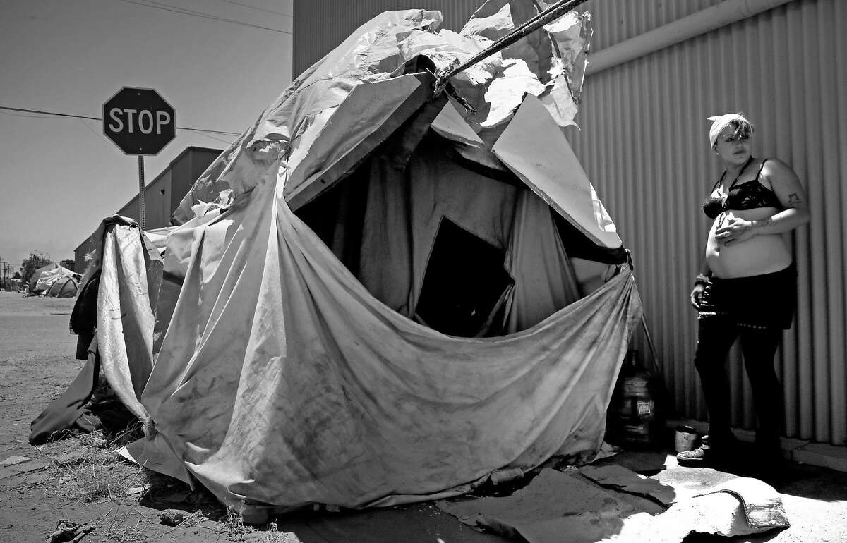 Samantha, 22 who is 8 months pregnant and been homeless for 5 years is living in an encampment on the corner of Cedar and 2nd streets in Berkeley, Ca., as seen on Friday June 23, 2017.