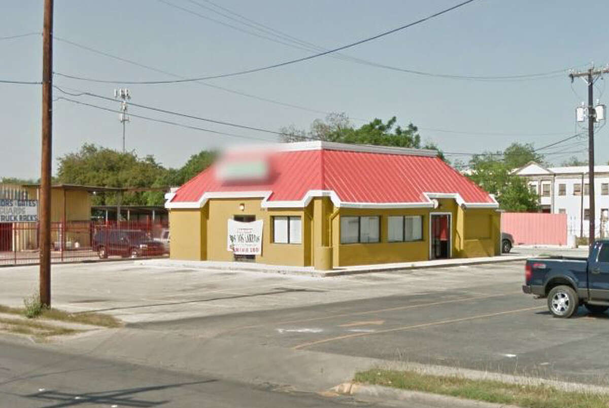Taqueria Los Dos Laredos: 414 S. New Braunfels, San Antonio, Texas 78203Date: 06/04/2018 Score: 70 Highlights: Inspector Observed dishes soaking in sanitizer that was cloudy and had food debris in them. Dirty dishes were stored on the drain board and some of the items had sauces or liquids that were draining into the sanitizer. Broken/cracked containers and lids holding bulk foods. Food stored in walk in cooler without covers. Mold like debris on plastic refrigerator shelves. Shelves in cooler had rust on them. Employee handling a prepared taco with bare hands. Broken Styrofoam cup in pancake mix. Plates and bowls used as reusable scoops. Whole tomatillos that had rotted. Fresco Cheese wheel stored with cheese in direct contact with rusty shelf. Debris build up on ceiling tiles and under and behind tables and equipment. Holes in walls. Ground beef and Chorizo held at incorrect temperatures. Grease crust build up and grease strands on vents above grills. Vents in kitchen had dust build up on surface.
