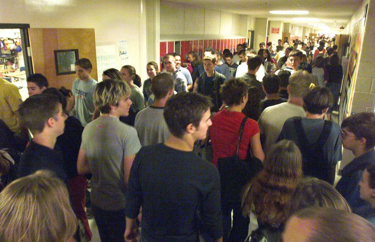 Students walk down a crowded hallway at Smithson Valley High School in Spring Branch in 2001. Unfortunately, San Antonio and Texas have significant number of youth between the ages 14 and 24 who are neither in school nor employed. They are disengaged and the city must steer them to services or suffer the consequences of have a population of rootless youth.