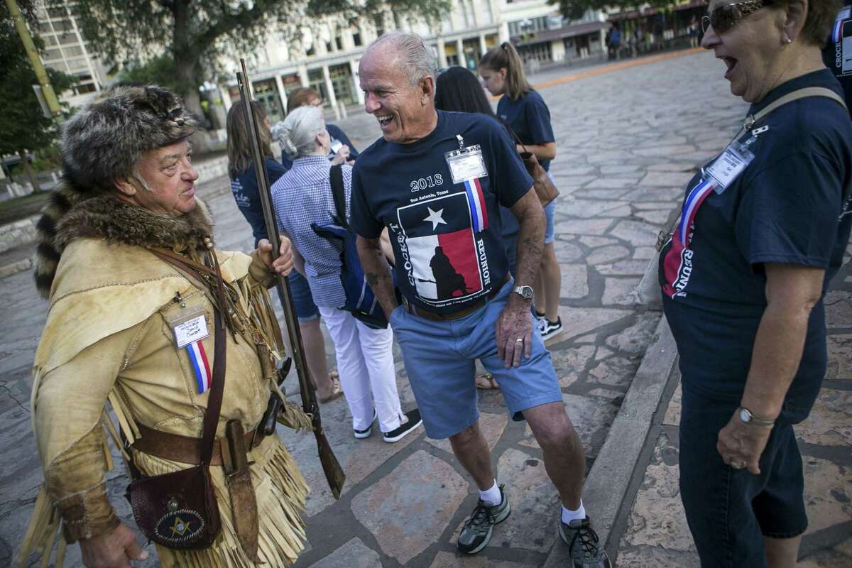 Dave Crockett, center, laughs at a joke David Crockett, left, made at the Alamo in San Antonio June 8, 2018. More than 150 members of the Direct Descendants and Kin of David Crockett gathered in San Antonio to honor the memory and celebrate the life of the famous David Crockett, who died defending the Alamo in 1836.