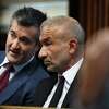 SUNY Polytechnic Institute Founding President and CEO Alain Kaloyeros speaks with his attorney while awaiting his arraignment on state charges while sitting in a courtroom at Albany City Courthouse on Friday morning, Sept. 23, 2016, in Albany, N.Y. (Will Waldron/Times Union archive)