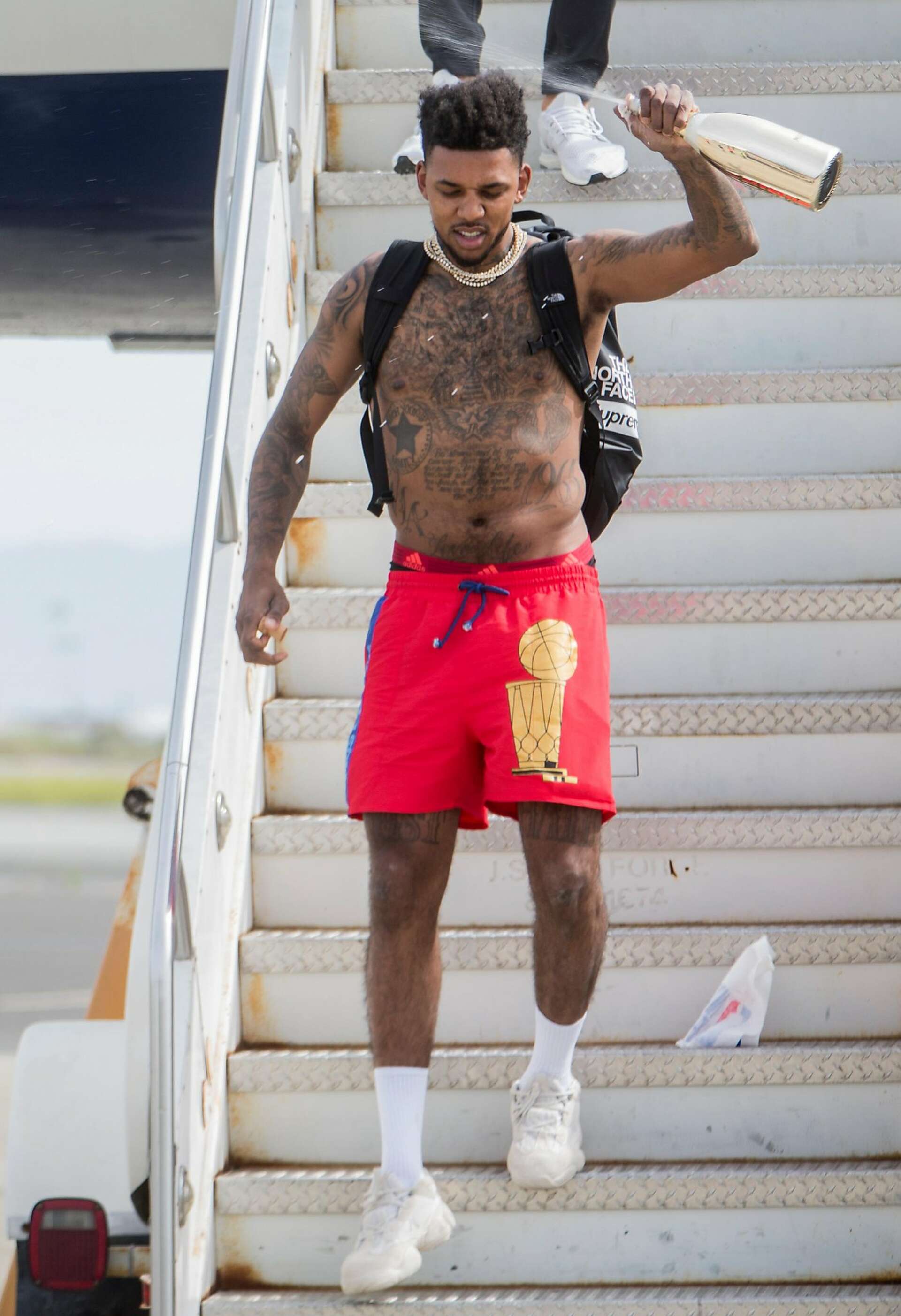draymond green dress shorts Incredible Warriors plane pic shows Draymond Green with the real trophy