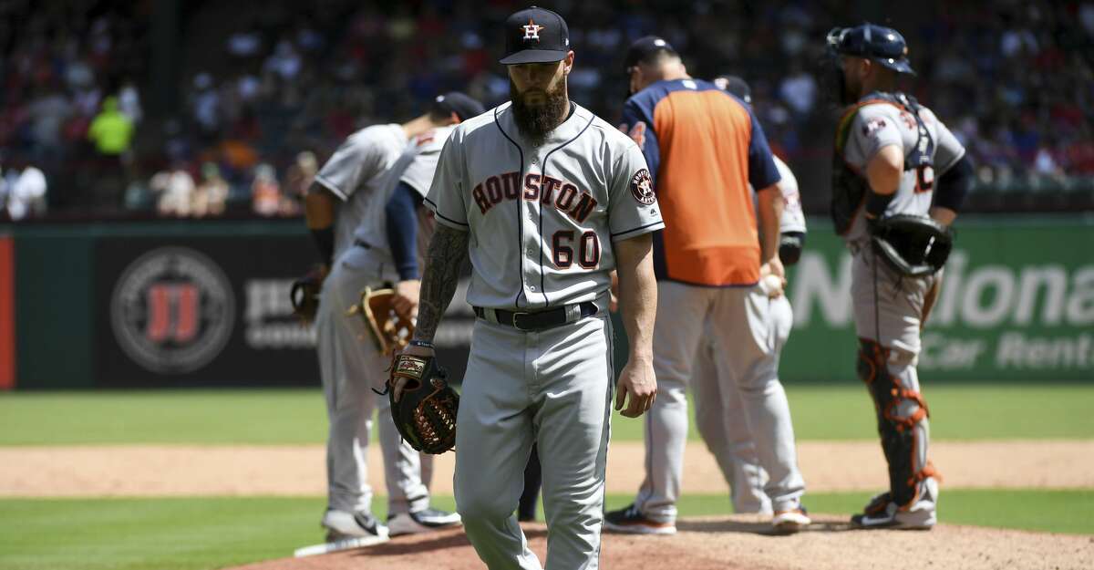 Houston Astros starting pitcher Dallas Keuchel (60) walks to the dugout after being pulled during the fifth inning of a baseball game against the Texas Rangers, Sunday, June 10, 2018, in Arlington, Texas. Houston won 8-7. (AP Photo/Jeffrey McWhorter)