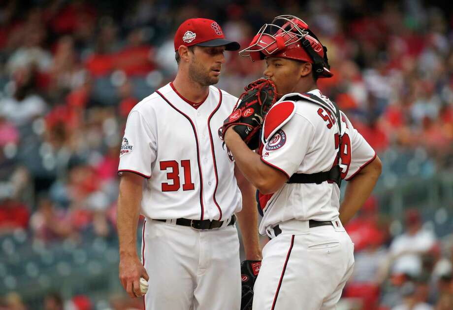 Washington Nationals starting pitcher Max Scherzer, left, and catcher Pedro Severino, right,  talk on the mound during the fourth inning of a baseball game against the San Francisco Giants at Nationals Park, Sunday, June 10, 2018, in Washington. (AP Photo/Alex Brandon) Photo: Alex Brandon / Copyright 2018 The Associated Press. All rights reserved.