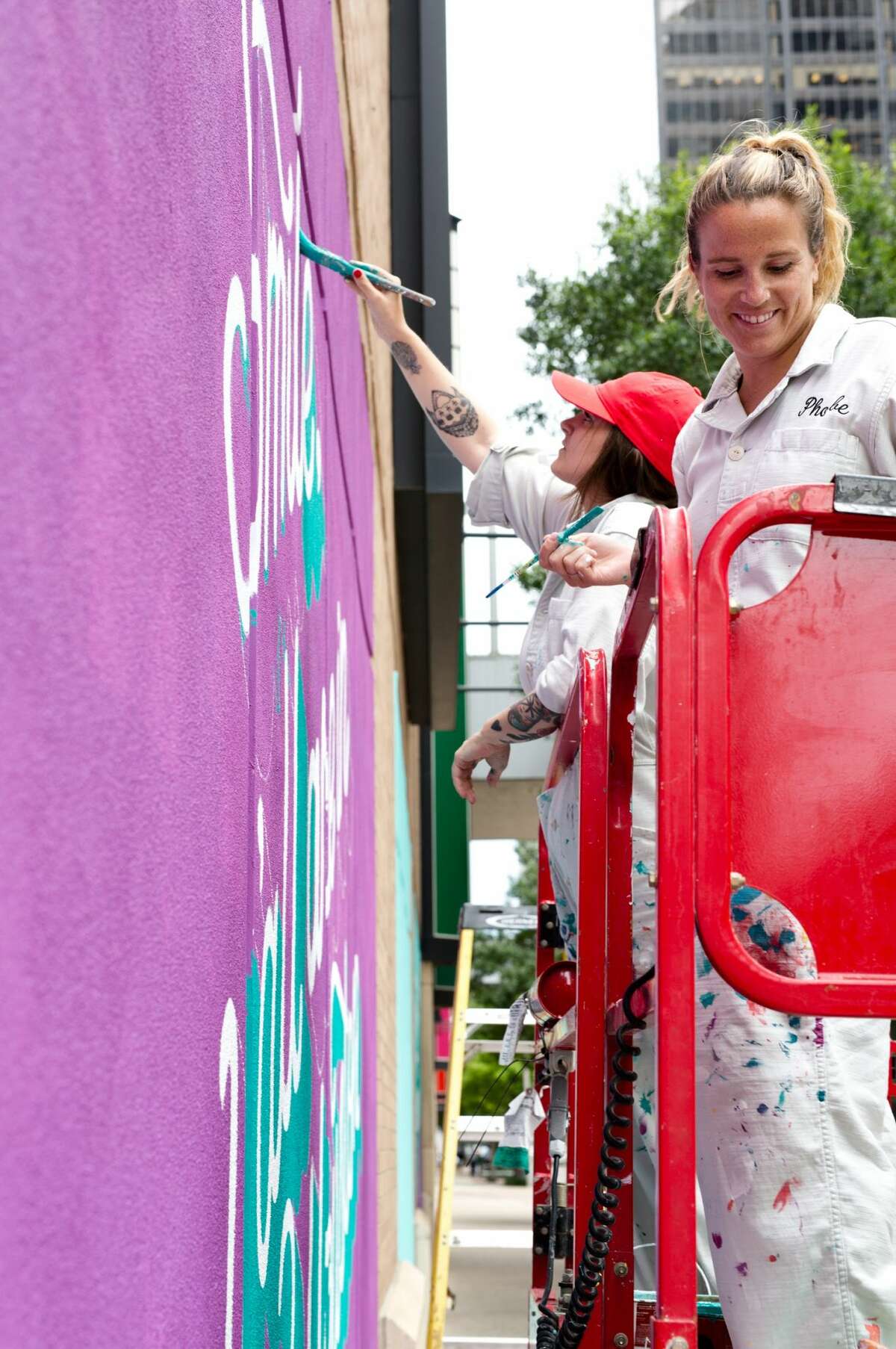Artists Roxy Prima and Phoebe Cornog were in town to oversee the painting of the vibrant murals they both designed. 